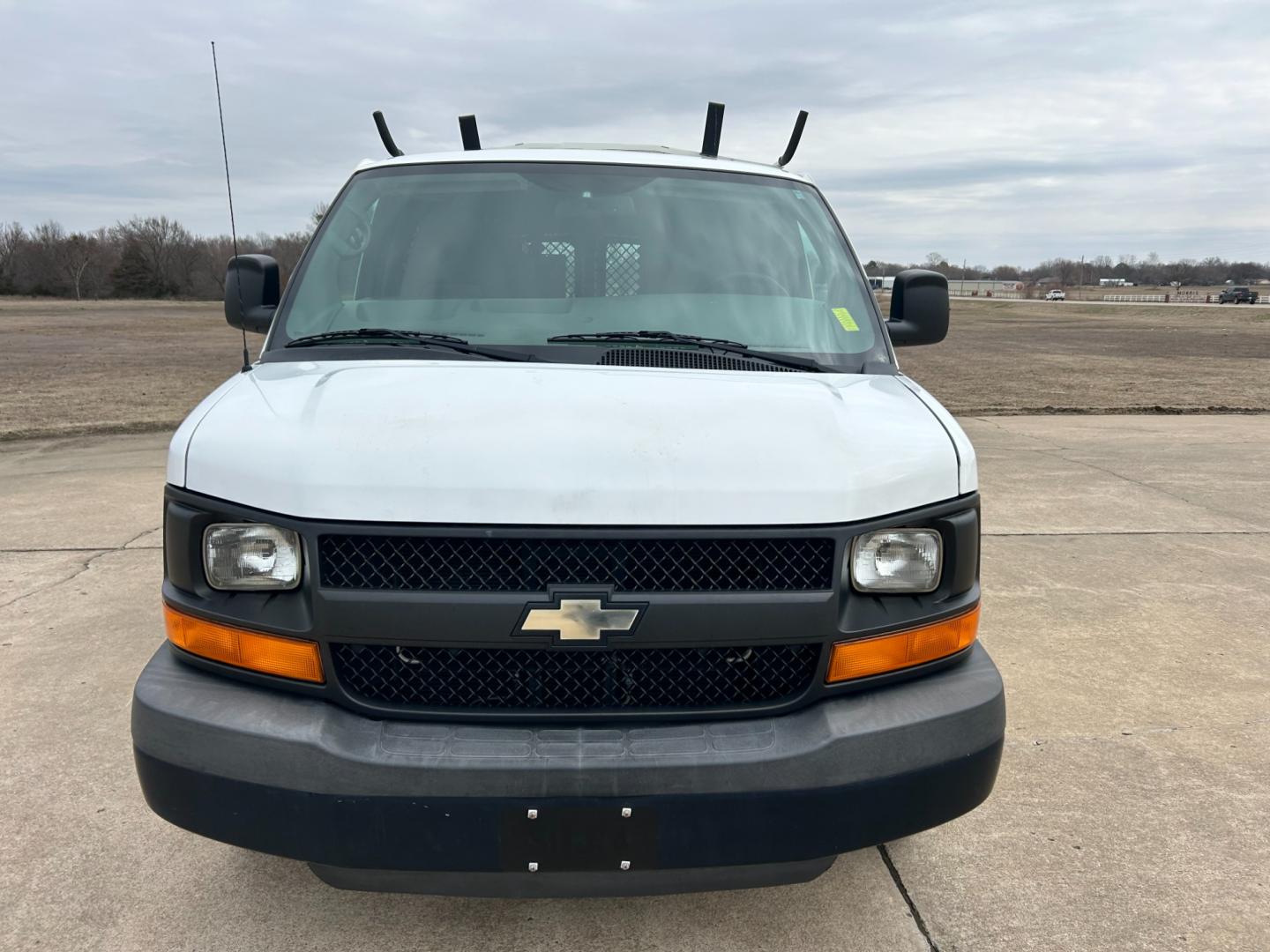 2012 White /Gray Chevrolet Express 2500 Cargo (1GCWGFCB4C1) with an 6.0L V8 OHV 16V FFV engine, 6-Speed Automatic transmission, located at 17760 Hwy 62, Morris, OK, 74445, (918) 733-4887, 35.609104, -95.877060 - Photo#1